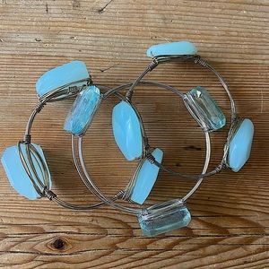 Set of three faceted stone bangles